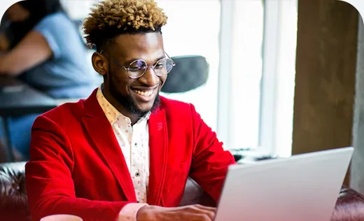 Man opening an account online on his laptop